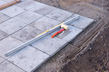 Laying patio tiles in the garden