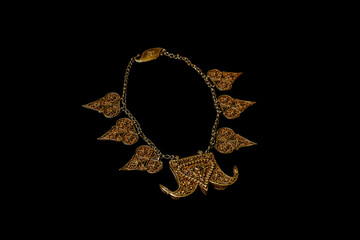A beautiful antique gold necklace filled with embellishments. A beautiful ancient gold necklace...