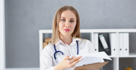 Beautiful smiling female doctor stand in office portrait. Physical and patient disease prevention exam er ward round 911 prescribe remedy healthy lifestyle consultant nurse profession concept - obrazy, fototapety, plakaty