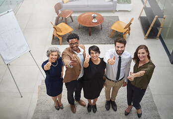 Top view, thumbs up and portrait of business people in office for good job, support or success of...