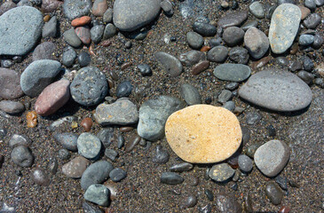 abstract image of stones from the ground of Kusamba beach in Bali Indonesia