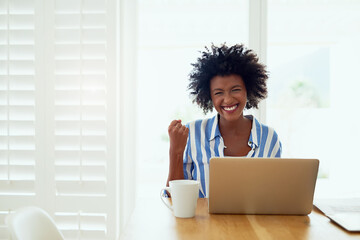 Portrait, black woman and laptop in home with celebration for career success, entrepreneur and fist. African female author, tech and achievement in house with victory, happiness and best selling book