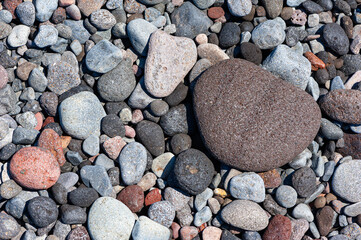 abstract image of stones from the ground of Kusamba beach in Bali Indonesia