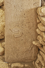 Gobekli Tepe neolithic archaeological site dating from 10 millennium BC, Massive stone pillars with...