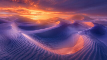 Fototapeta premium Sunrise paints unusual fractal patterns on undulating desert sand dunes with a vibrant orange and purple gradient sky as backdrop