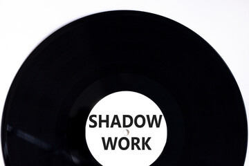 Shadow work psychology symbol. Concept words Shadow work on beautiful black vinyl disk. Beautiful...