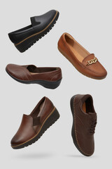 Creatively arranged floating collection of versatile daily wear shoes, a black slip-on with a serrated sole, a classic brown loafer a textured brown slip-on, and a brown leather shoe, neutral backdrop
