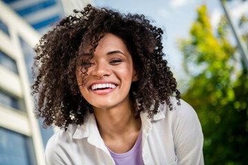 Portrait of cheerful positive cute woman enjoying summer holidays weekend and sunny warm weather...