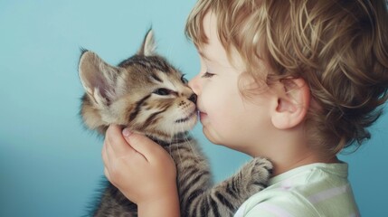 Little child and baby cat