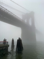 The Brooklyn Bridge as seen in the morning mist