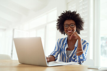 Portrait, black woman and laptop in house with glasses for remote work, online business and...