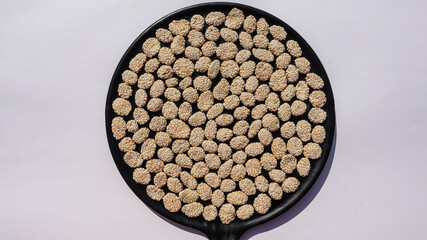 top view of Indian traditional sweets Rewadi, Revadi, Revdi, Revari made of sesame seeds