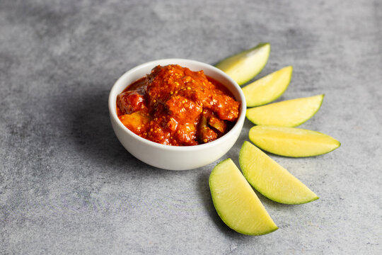 selective focus of Mango Pickle with green sliced mango. 