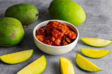 selective focus of Mango Pickle with green sliced mango. 