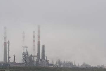 Foggy oil refinery