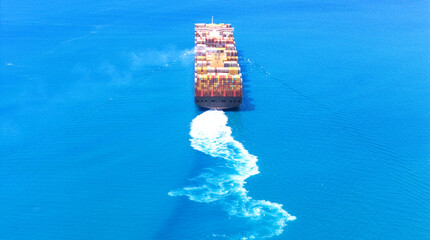 Top view Container ship full capacity approaching port International Container ship loading, unloading at sea port, Freight Transportation, Shipping,  