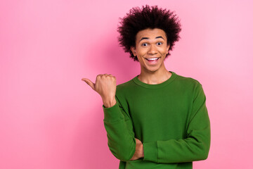 Photo of happy positive guy impressed point finger empty space ads isolated pastel color background