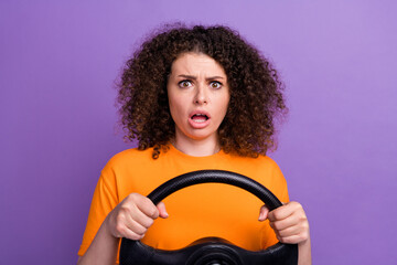 Photo of impressed stressed woman wear orange t-shirt riding auto getting car accident isolated...