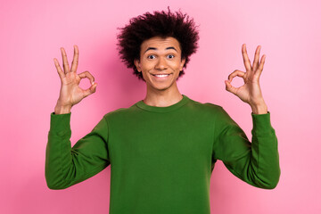 Photo of happy positive guy make double okay sign approve isolated pastel color background
