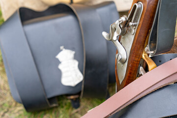 19th century rifle firing mechanism and ammunition bag