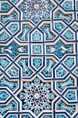 tile Uzbek mosaic with oriental Islamic pattern decorated with blue and white floral ornament