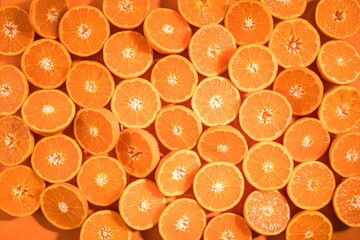 Close up of cut tangerine halves
