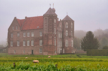 Croy castle in a misty landscape