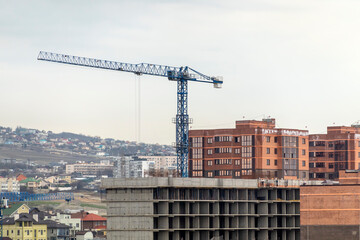 Novorossiysk Two hoisting cranes and buildings under construction