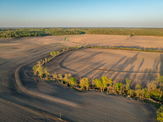 springtime aerial view of plowed corn fields in central Missouri at sunrise