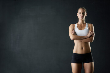 Fitness, body and portrait of woman with arms crossed in studio for health, training and wellness...