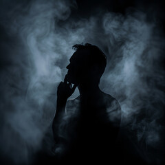 Silhouetted person with smoke and dark background.