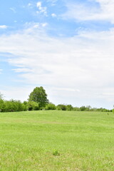 Clouds in a Blue Sky Over a Rural Farm Field