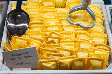 Italian food, fresh homemade pasta pumpkin and amaretti ravioli ready to cook on Portobello road...