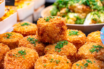 Fishcake with crab meat, prawns and salmon fish in breadcrumbs