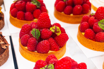 Sweet cake red fruits and berries framboise tartlets with cream