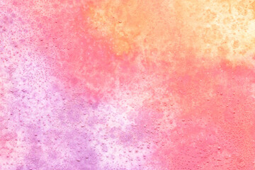 Colorful watercolor texture. Abstract hand-drawn background in pastel pink, yellow and purple colors.
