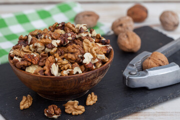 Raw wallnuts in bowl. Healthy snack, vegetarian food full of protein, beer snack..