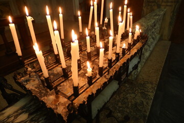 Devout Light Votive Candles in Spiritual Temple