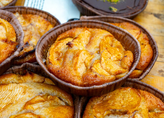 Sweet pastries, rustic apple cakes, cherry, almond cakes on food market in London, UK