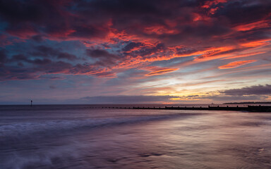 Blyth Beach, Northumberland, England, UK.  Sunrise sea view. Morning light over beach.