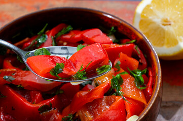 Grilled red peppers, sweet paprika salade with fresh garlic and parsley