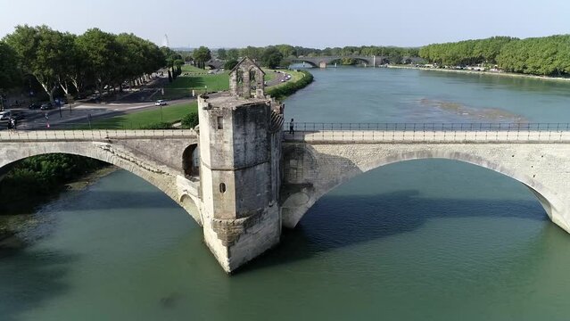 Aerial view of Saint B&eacute;n&eacute;zet also known as Pont d'Avignon is a famous medieval bridge over the Rhone in the town of Avignon in southern France and a popular tourist attration 4k high resolution