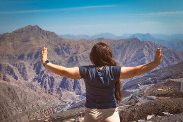 person standing on top of mountain