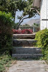 stone staircase in garden during a sunny day in Lima peru
