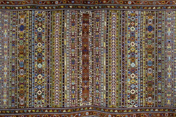 carpet with a colorful pattern in silk thread