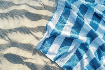 Flat lay of fabric towel on beach sand