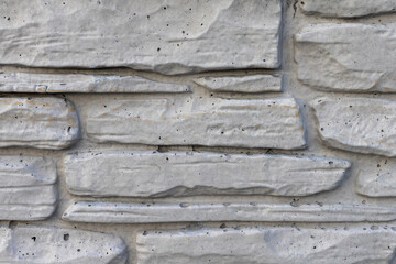 Texture of a stone wall. Old building gray textured background.