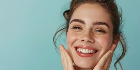 CAUCASIAN Woman smiling while touching her flawless glowy skin with copy space for your advertisement, skincare