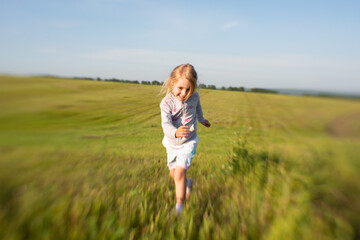 girl runs across the field, kid, childhood, yellow field, blonde