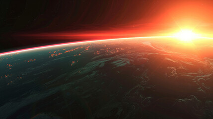 Rising sun paints the Earth's horizon with colors as it dips beneath the curve of the planet.